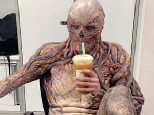 Stranger Things Vecna Drinking Behind The Scene Wallpaper