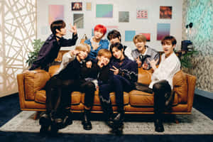 Stray Kids Group Photoon Couch Wallpaper