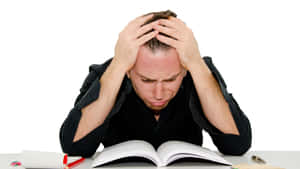 Stressed Student Studying.jpg Wallpaper