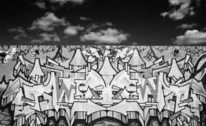 Striking Black And White Graffiti Art On Urban Walls Wallpaper