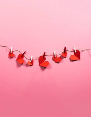 String With Aesthetic Heart Cutouts Wallpaper