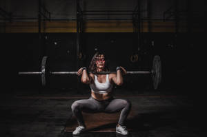 Strong Woman With Barbell Wallpaper