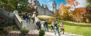 Students Socializing By Lehigh University Center Tower Wallpaper