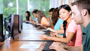 Students Workingon Computersin Classroom.jpg Wallpaper