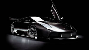 Stunning Black Lamborghini Murcielago - A Masterpiece Of Sportscar Engineering Wallpaper