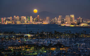 Stunning Full Moon Illuminating San Diego Skyline Wallpaper