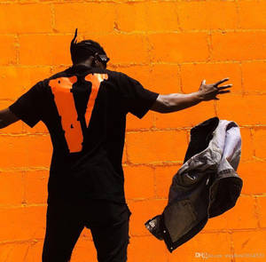Stunning Orange Vlone Logo For A Distinctive Pfp Wallpaper