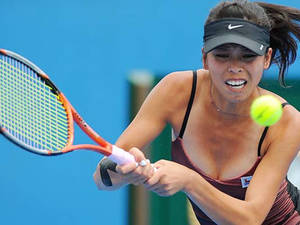 Su-wei Hsieh In Thrilling Action During A Tennis Match Wallpaper