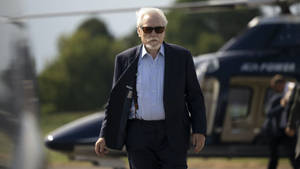 Succession Logan Roy Departing From Helicopter Wallpaper