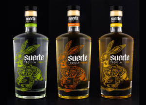 Suerte Tequila Elegant Bottles Wallpaper