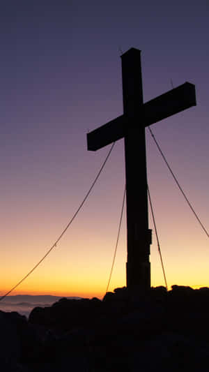 Summit Beautiful Cross With Purple Sunset Sky Wallpaper