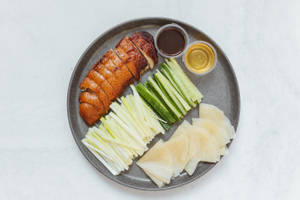 Sumptuous Sliced Peking Duck Ready To Serve Wallpaper