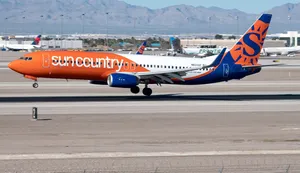 Sun Country Passenger Aircraft On The Runway Wallpaper