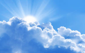 Sun Peering Out Of Funeral Clouds Wallpaper