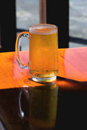 Sunlit Glass Of Beer Wallpaper