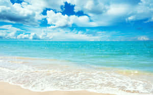 Sunny_ Beachscape_with_ Clouds Wallpaper