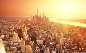 Sunrise Glowing On New York Skyline Wallpaper