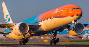 Sunset Capture Of Klm Orange Pride Wallpaper