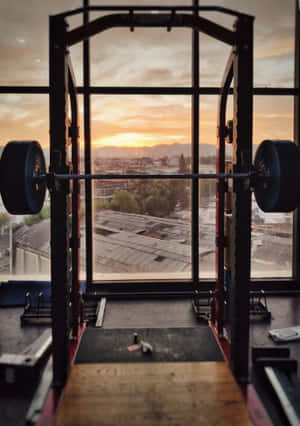 Sunset Gym Squat Rack View.jpg Wallpaper