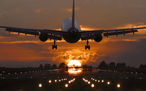 Sunset Landing Airplane Wallpaper