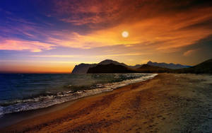 Sunset Rocky Beach Desktop Wallpaper