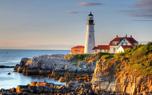 Sunset Town Lighthouse Wallpaper