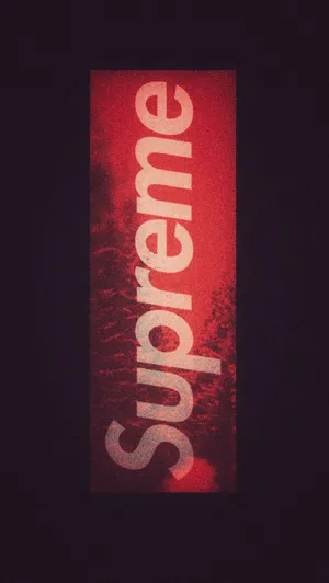Supreme Logo In Red On A Black Background Wallpaper