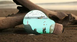 Surreal Lightbulb Ocean Scene.jpg Wallpaper