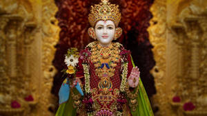 Swaminarayan In Red And Yellow Wallpaper
