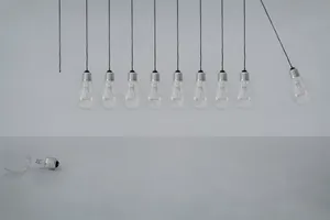 Swinging Transparent Light Bulbs Wallpaper