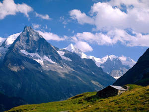 Swiss Alps And Calm Sky Wallpaper