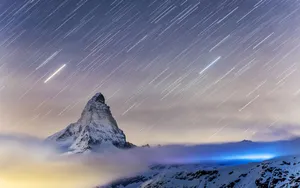 Swiss Alps Meteor Shower Wallpaper