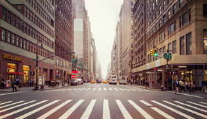 Take A Stroll Down The Iconic Streets Of New York City. Wallpaper