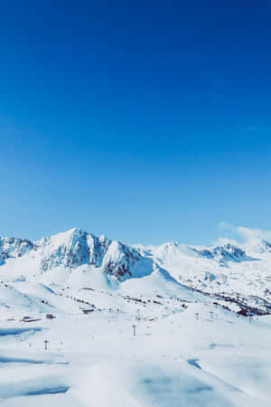 Take In The Splendid Views At A Ski Mountain Wallpaper