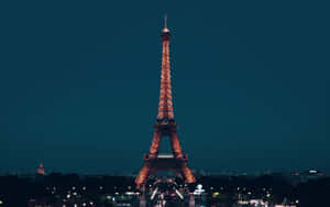 Tall Tower Paris At Night Wallpaper