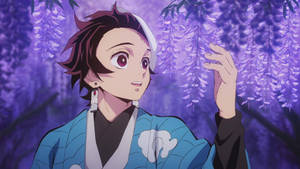Tanjiro Kamado With Purple Flowers Wallpaper
