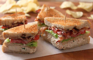 Tasty Tuna Club Sandwich For A Quick Lunch Wallpaper