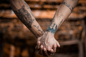 Tattooed Couple Hands Wallpaper