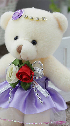 Teddy Bear In A Stylish Dress Wallpaper