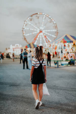 Teenage Girl At A Carnival Festival Wallpaper