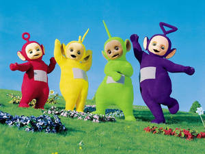 Teletubbies Dancing Together Wallpaper