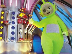 Teletubbies Dipsy Using A Machine Wallpaper