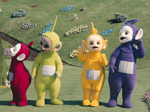 Teletubbies Listening Intently Wallpaper