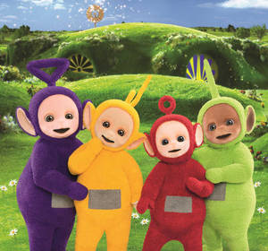 Teletubbies Posing In Teletubbyland Wallpaper