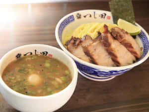 Tempting Bowl Of Savory Pork Ramen Wallpaper