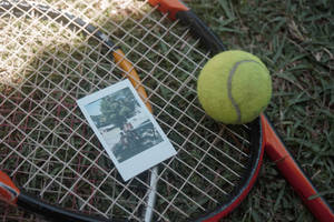 Tennis Ball And Racket Wallpaper