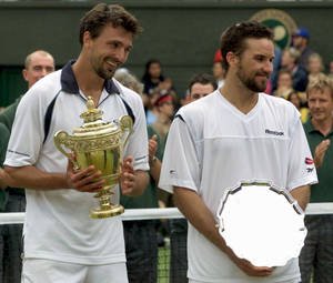 Tennis Legends Patrick Rafter And Goran Ivanisevic Sharing A Joyful Moment Wallpaper