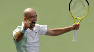 Tennis Player Celebrating Victory Wallpaper