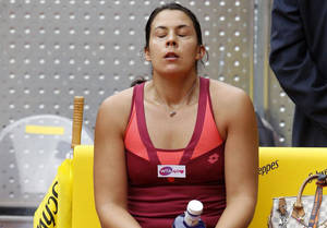 Tennis Professional Marion Bartoli Showing Dismay In Game Wallpaper