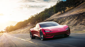 Tesla Roadster Motion Uhd Wallpaper